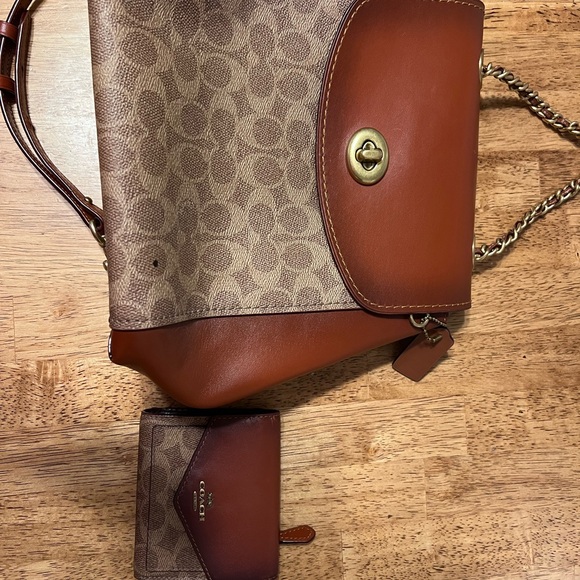 Coach backpack with matching wallet. Used a few times. One mark as seen in photo - Picture 7 of 8